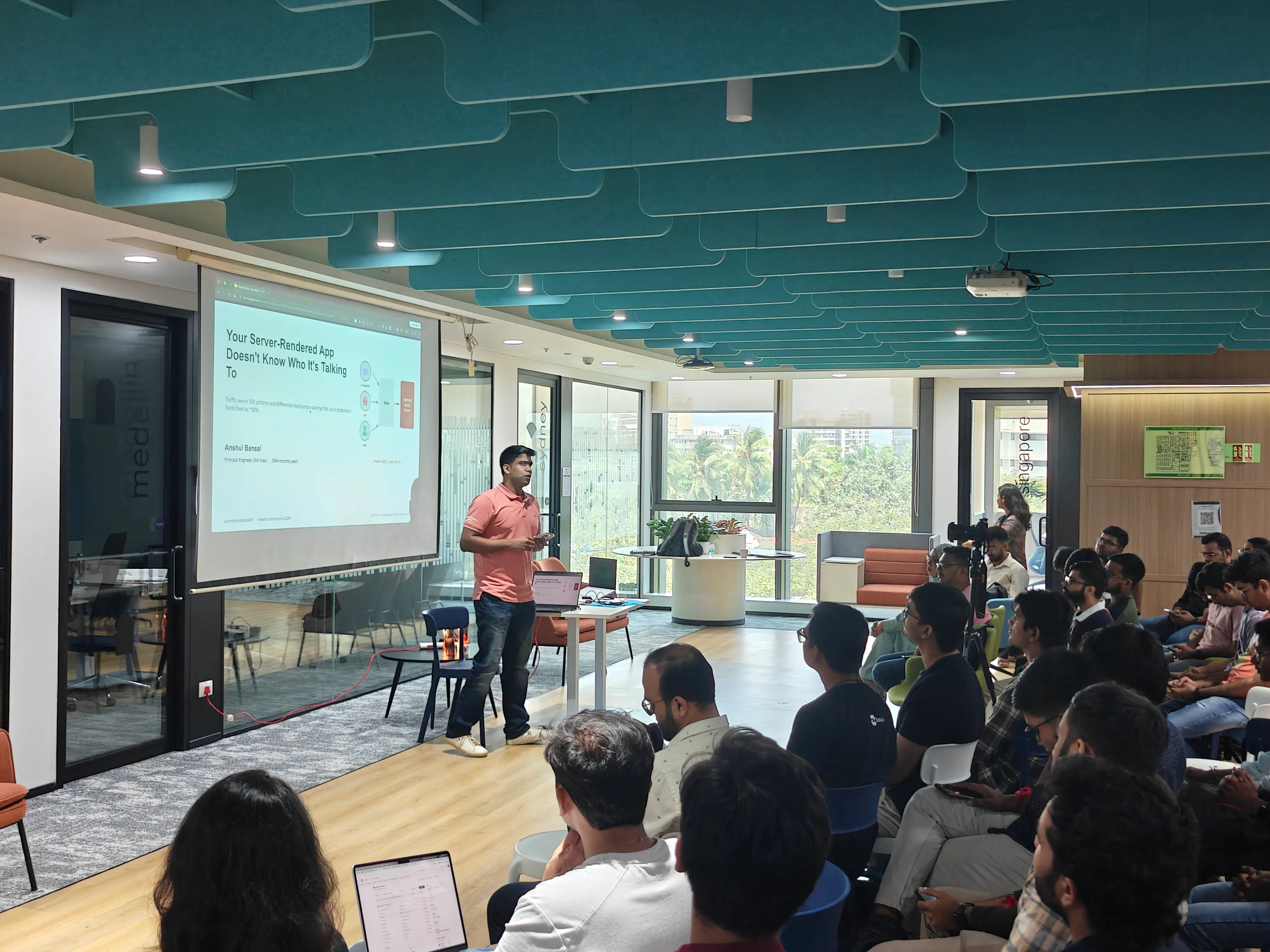 Speaker presenting on stage at Dev Days Mumbai